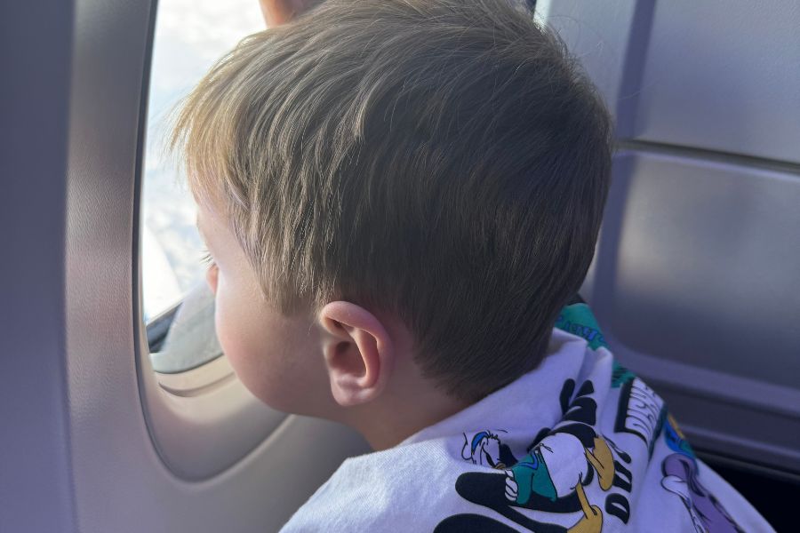 child on airplane