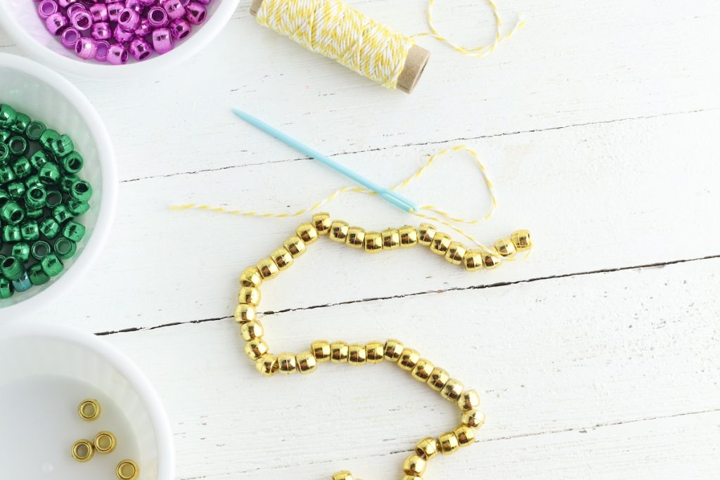 thread the bead onto string